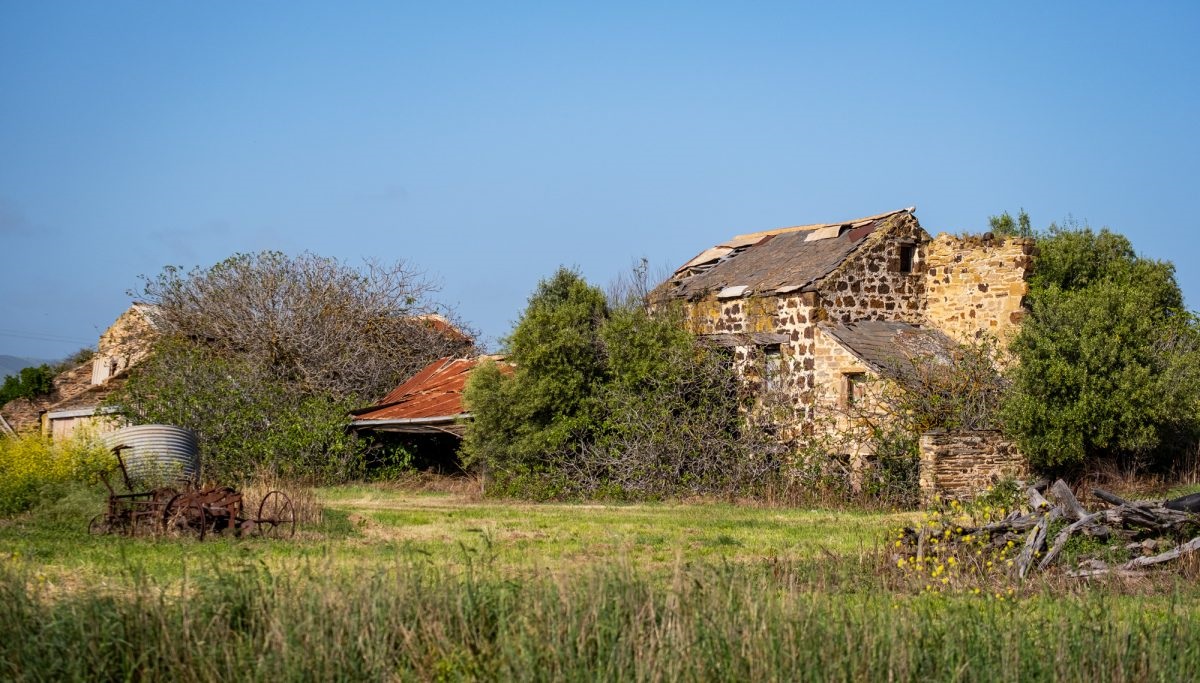 the house constructed from stone salvaged from the flour mill chimney