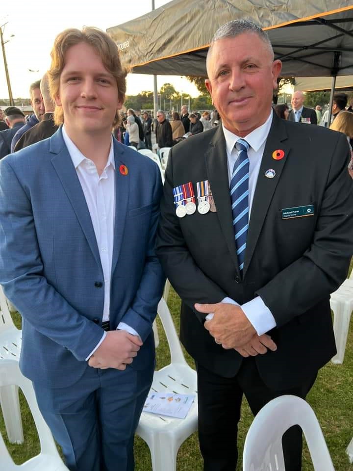 Colt Stafford alongside deputy mayor Michael Fisher.
