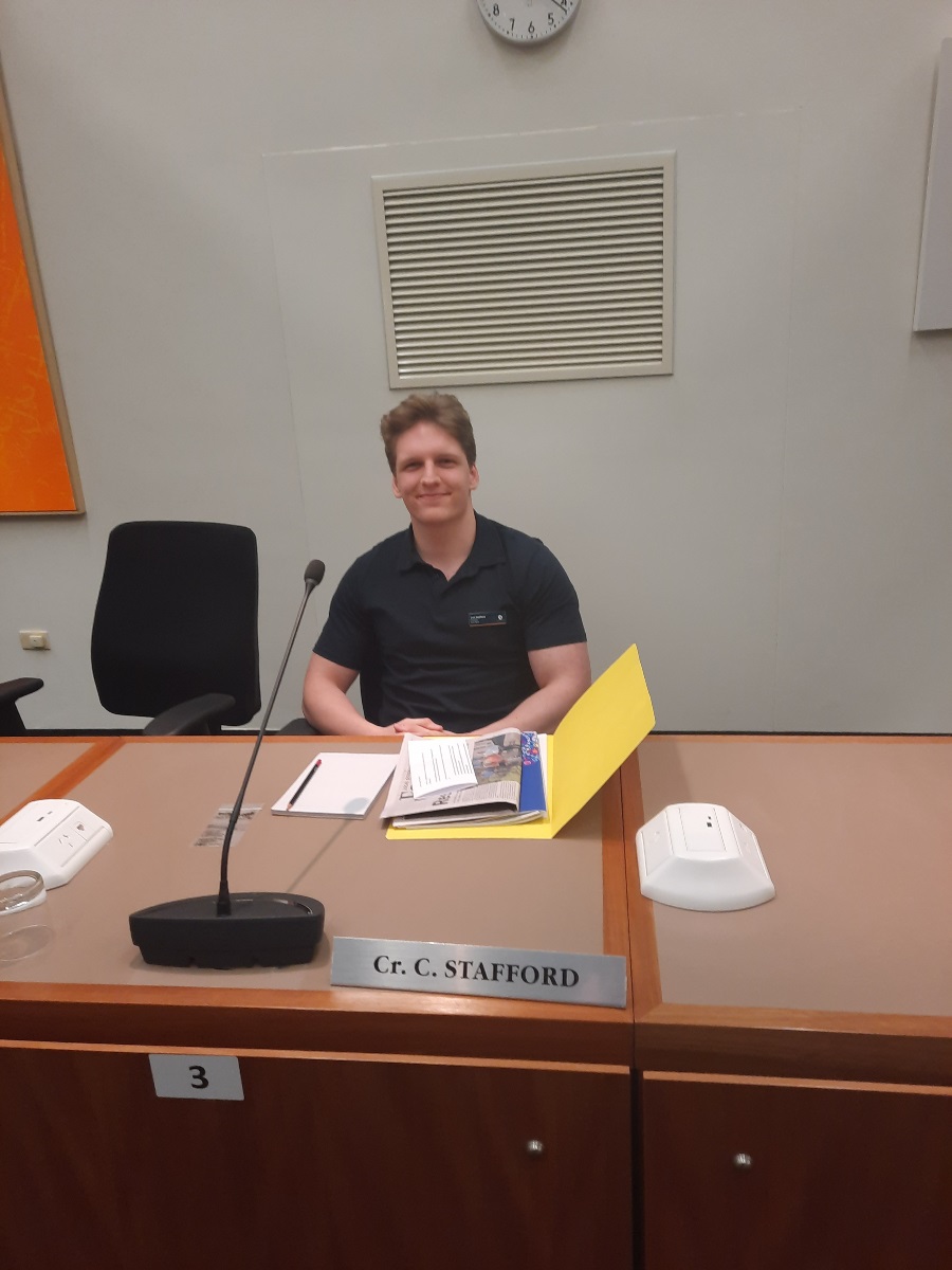 Colt Stafford sits at his desk in the Council chamber.