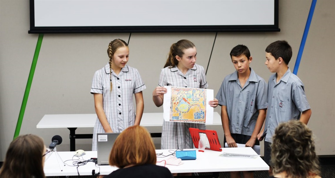 Students present their findings as part of the Climate Ready Schools program.