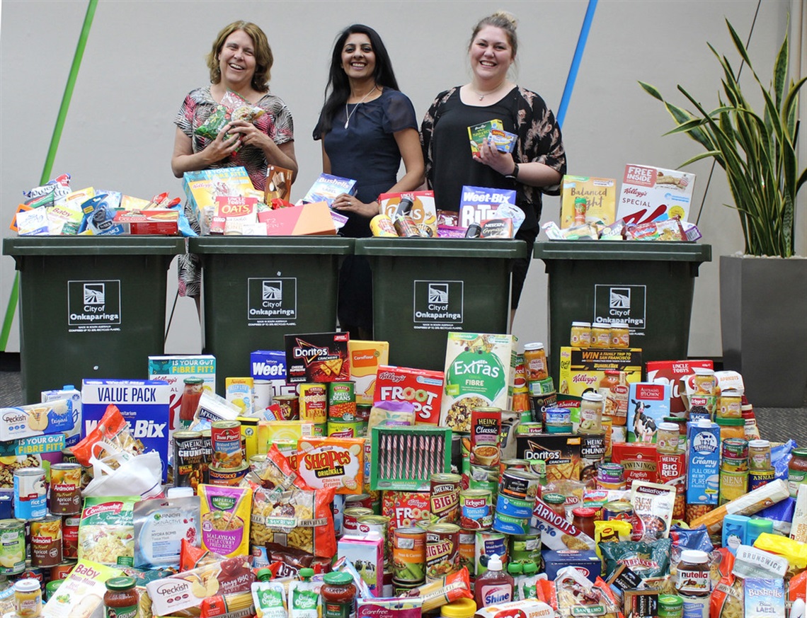 TERRA LEA, ROOXANA AND SAM WITH THE ITEMS DONATED BY COUNCIL STAFF.