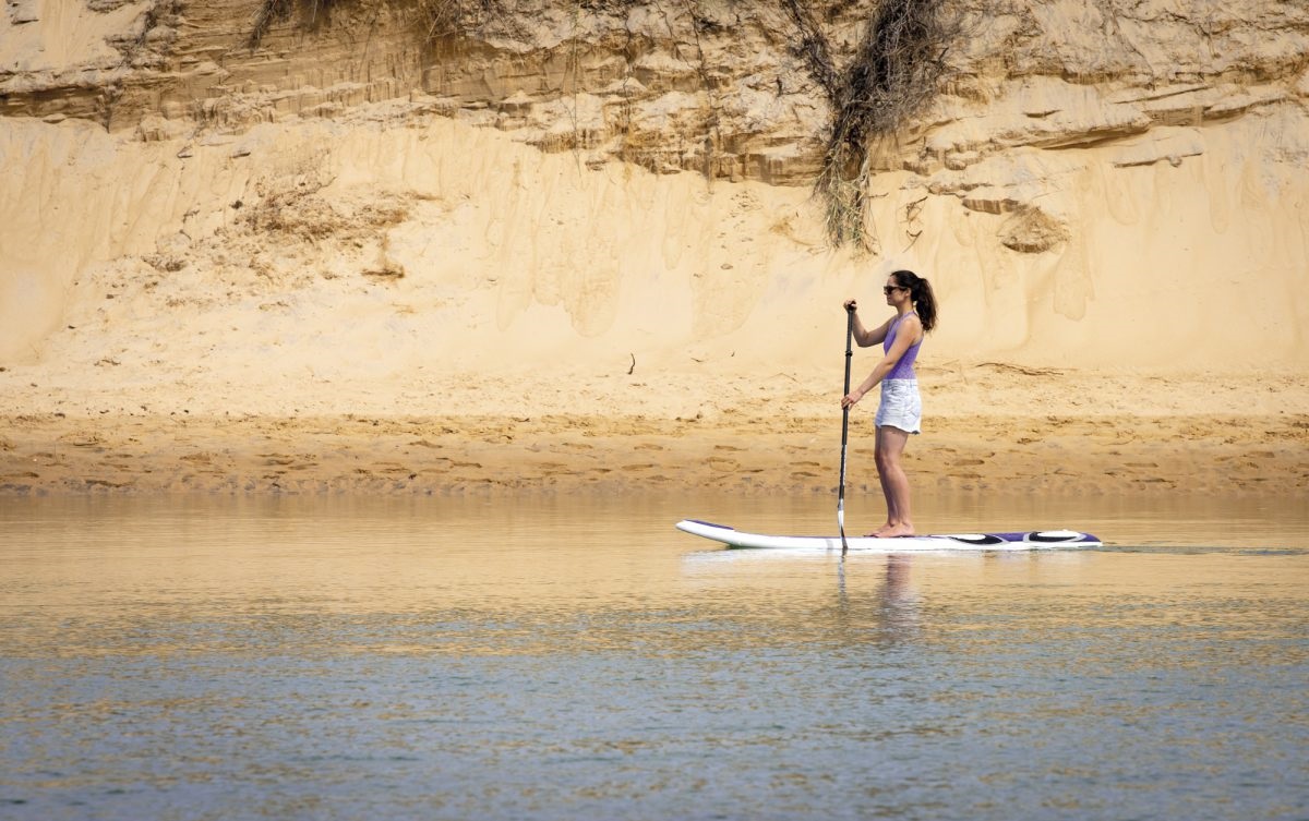 Amy paddles the Onkaparinga Rivermouth