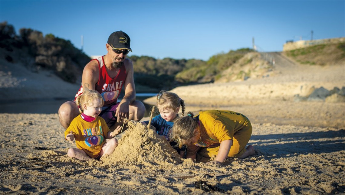 The beach is a playground all year round for Aaron Nieassis and his daughters Winta (2), Darci (4) and Summa (6). “The girls love the beach; 