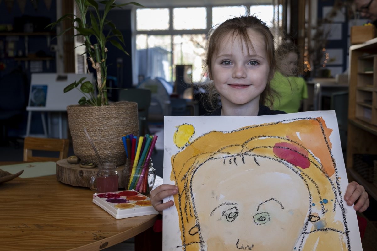 Some of the children from Freida Corpe Kindergarten proudly show-off their self portraits.