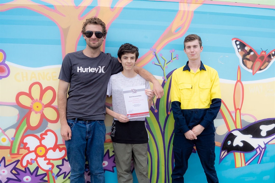 Jordan Ellis, Nic Grant and David King with their award outside the Aldinga Recreation Centre.