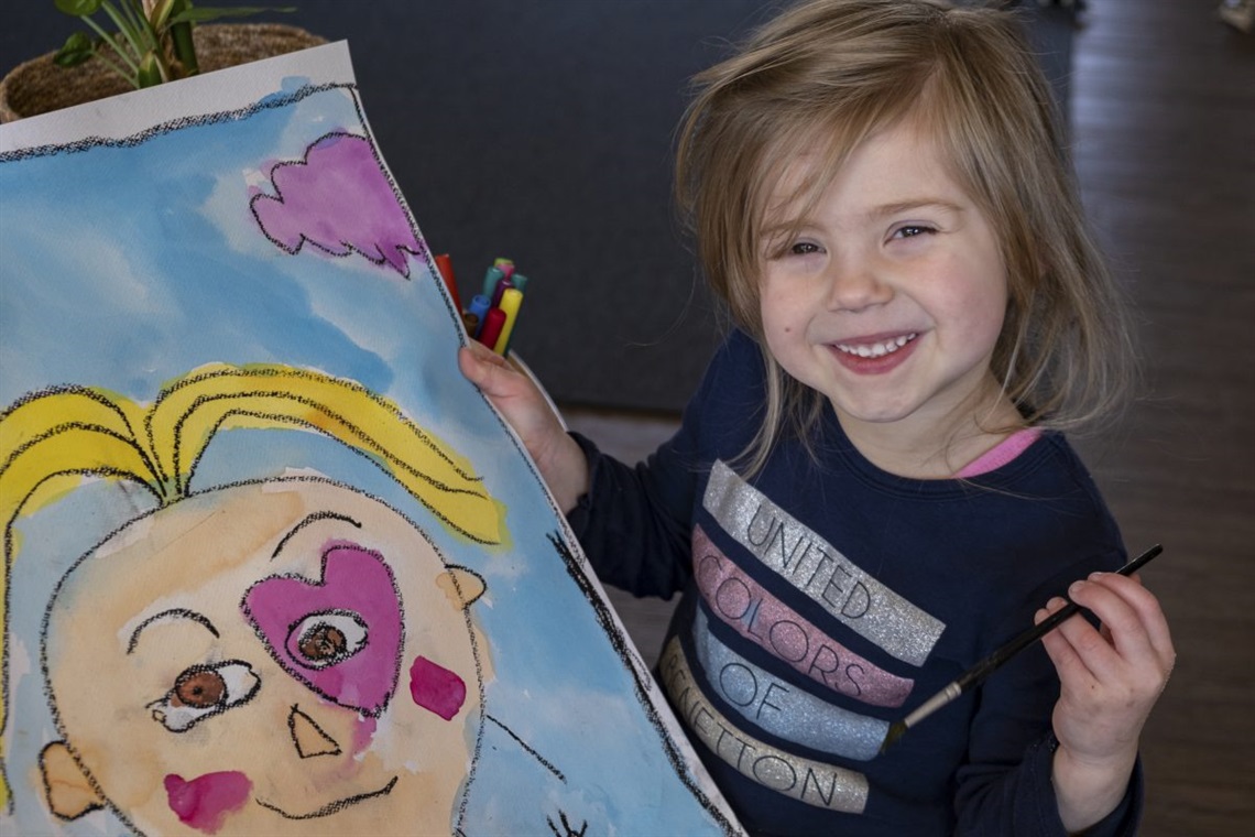 Some of the children from Freida Corpe Kindergarten proudly show-off their self portraits.