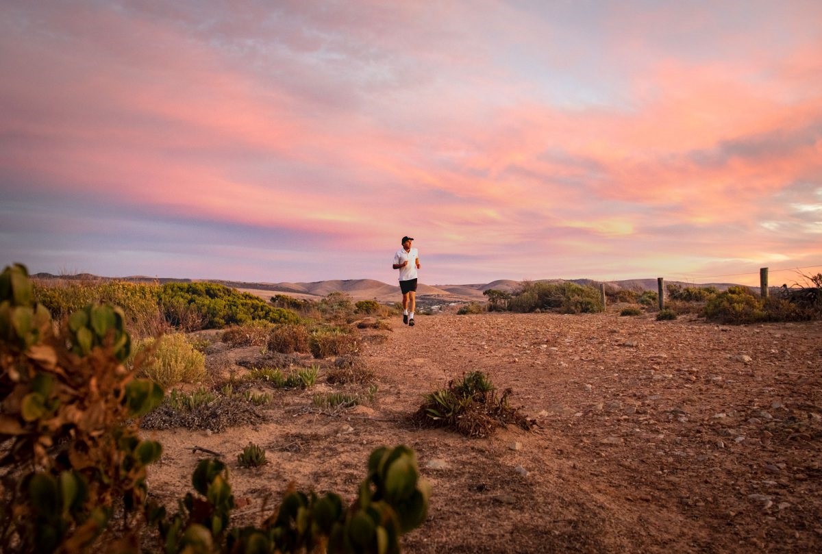 A jogger takes in coastal views at Silver Sands
