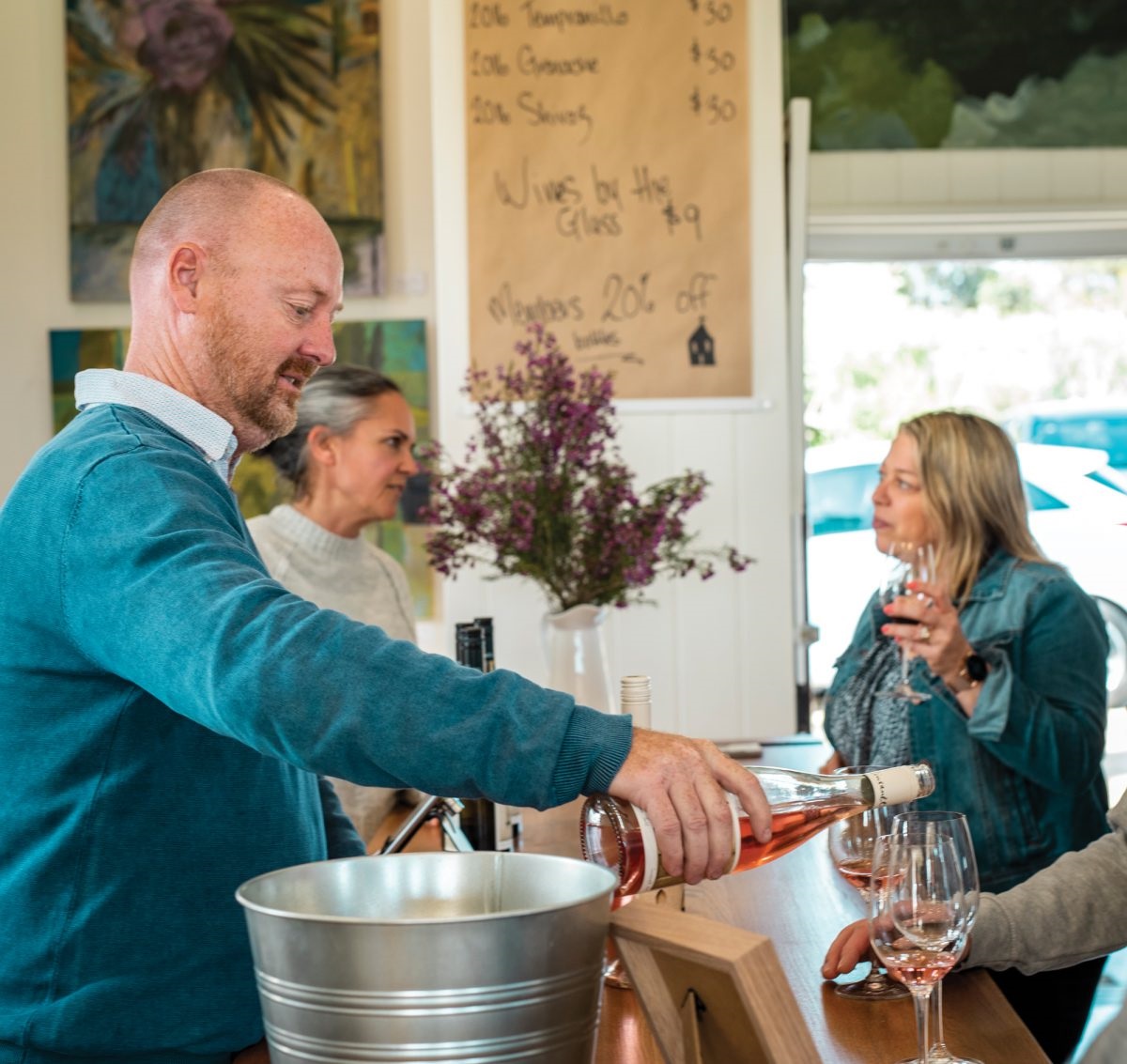 Paul Wilson and Heather Budich serve fine wine at Samson Tall’s new cellar door