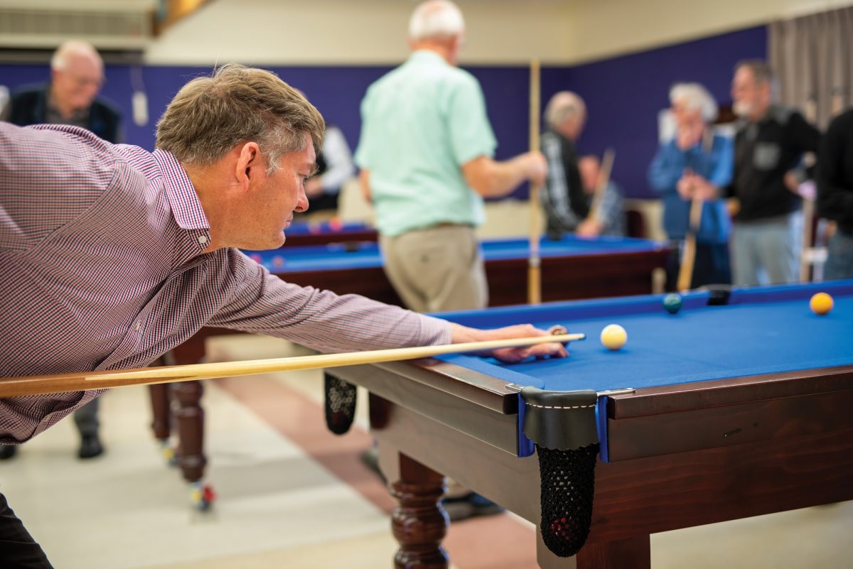Playing pool at positive ageing centre, Wakefield House.
