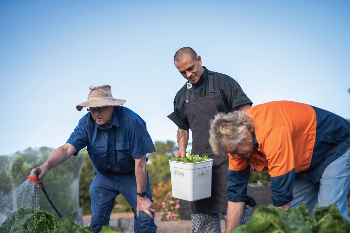 Wakefield House’s Terry Downes, centre, values the gardening know-how of volunteers such as Tony and Chri.