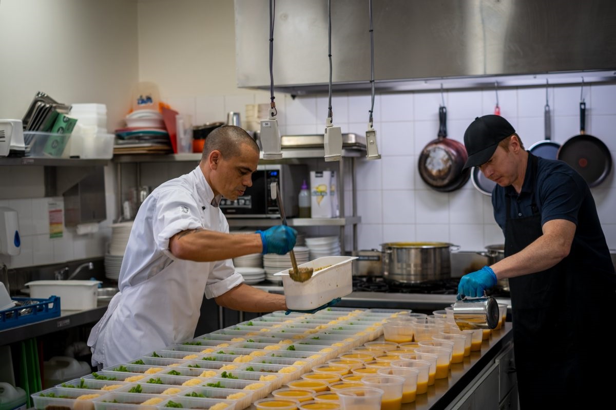 Wakefield House’s chef Terry Downes (left) and volunteer chef Steve Fiford preparing meal