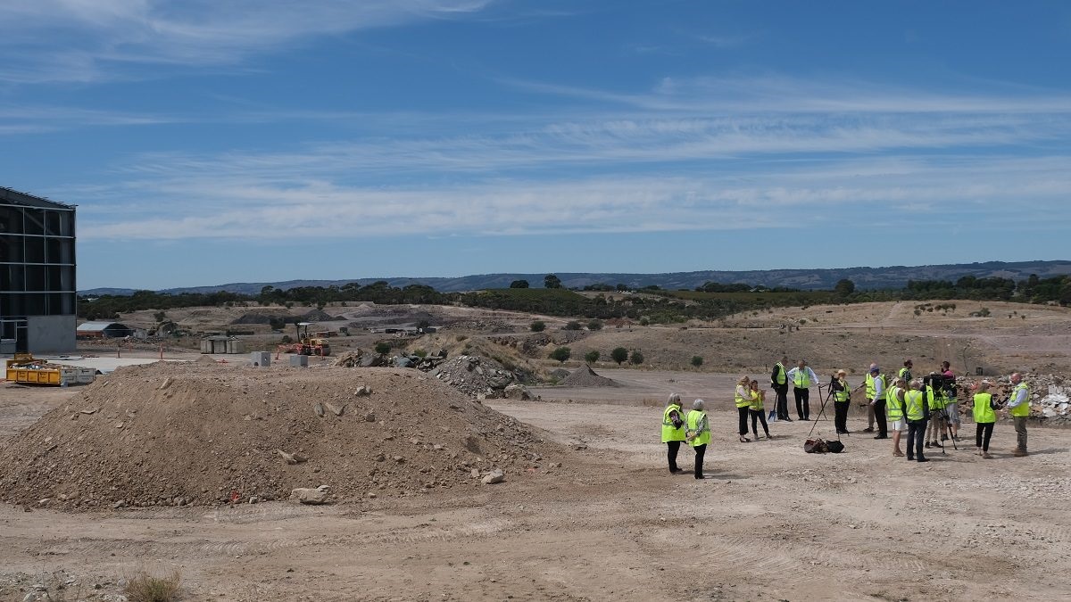 On the site of the new material recycling facility planned for Seaford Heights (left to right): City of Marion Mayor Kris Hanna, SRWRA CEO Chris Adams, City of Holdfast Bay Mayor Amanda Wilson, and City of Onkaparinga Mayor Erin Thompson.
