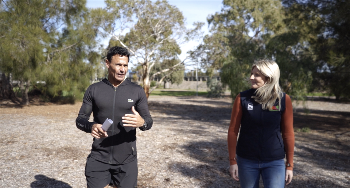 Roger Rasheed and Erin Thompson walk through Morton Road Reserve; artist impressions of the sports and community hub