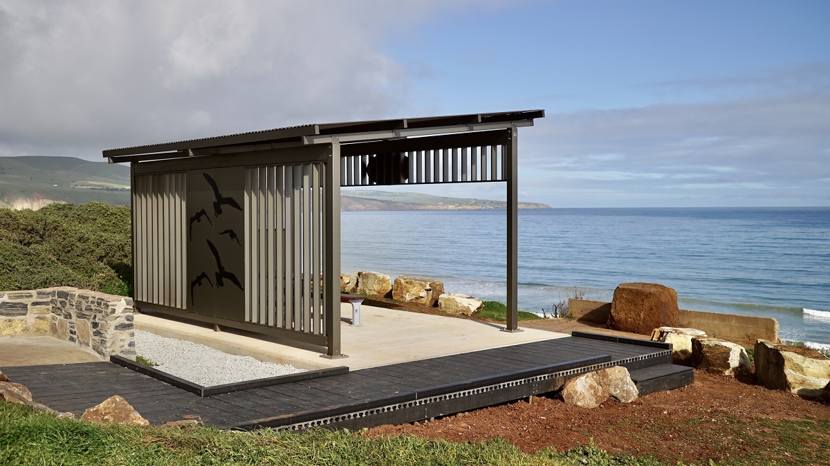 Scenes from the new beach shelter at Sellicks Beach, where recycled plastic was used for the decking. Photos: Terrain Group