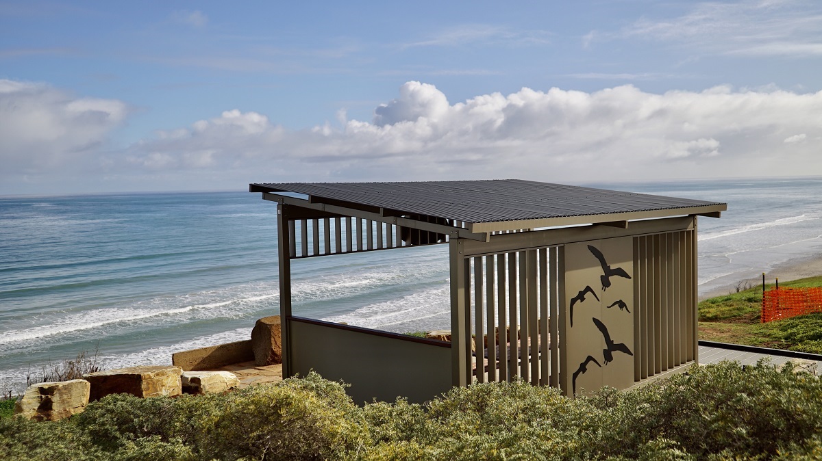 Scenes from the new beach shelter at Sellicks Beach, where recycled plastic was used for the decking. Photos: Terrain Group
