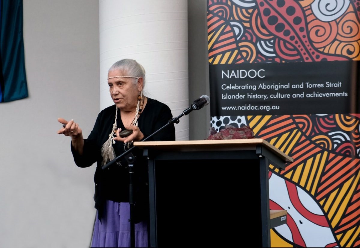 aurna Elder Georgina Williams (Ngankiburka-Mekauwe) greeting participants to Country during a previous NAIDOC Week event.