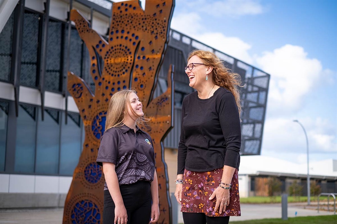 Year eight student Ruby and Principal Alison Colbeck tour the new school.