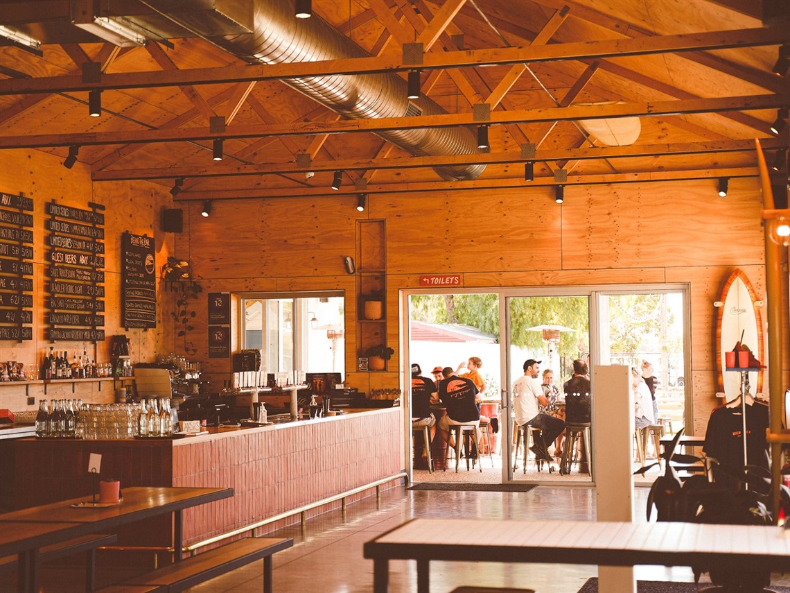 The warm interior of Kick Back Brewing.