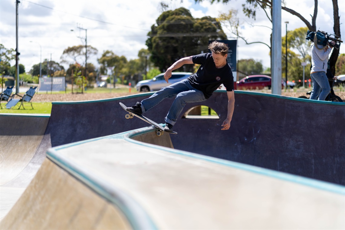 A skateboarder grinds on the coping at the Morton Road skate park.
