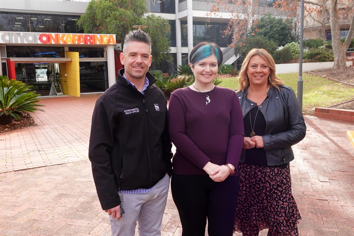 Onkaparinga Council environmental health officer, Craig, alongside Season and council's Team Leader Community Health, Nicole, outside the Noarlunga council offices.