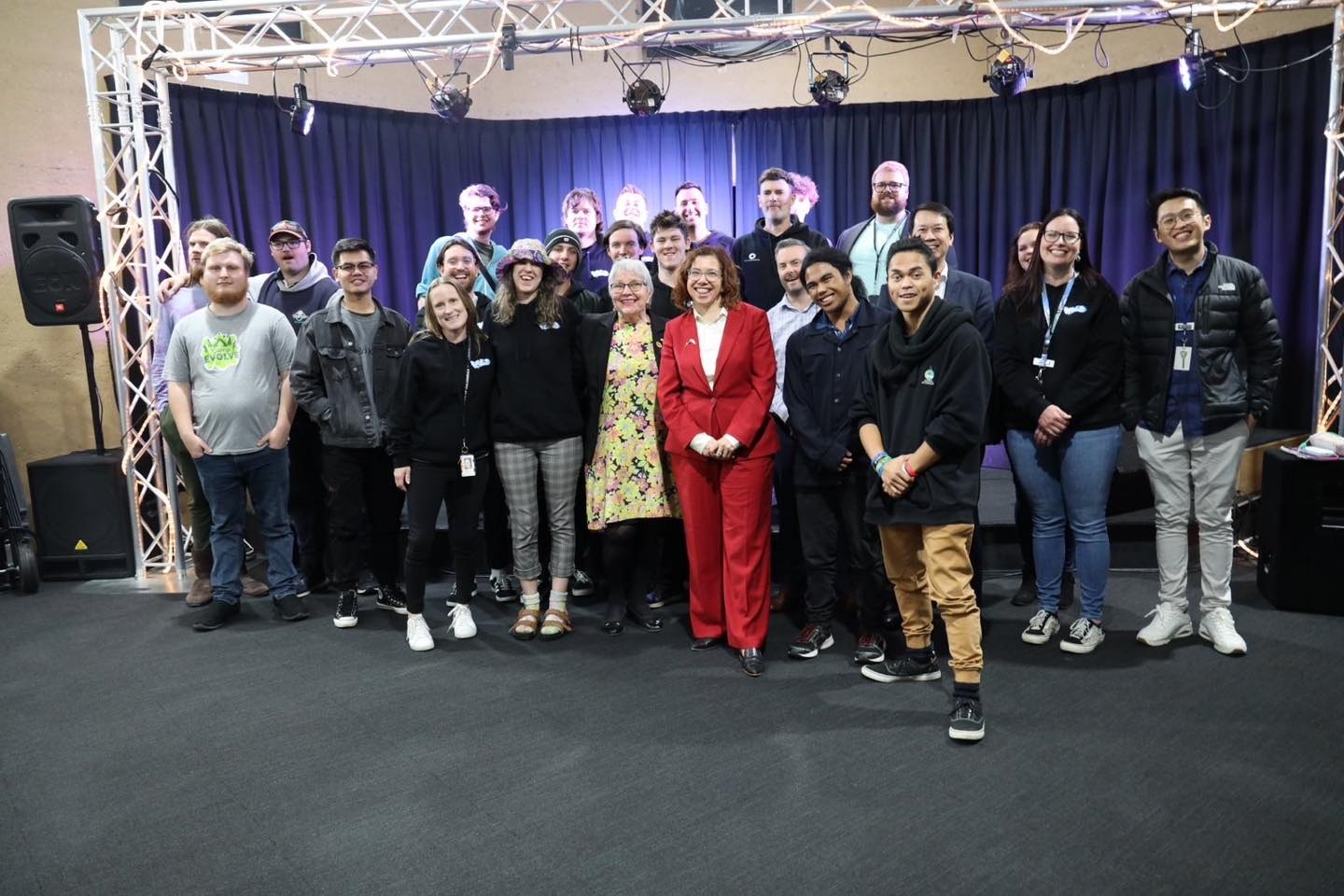 Amanda Rishworth MP, Mayor Moira Were and Base 10 Youth Centre staff and participants smile as their live music funding is officially announced.