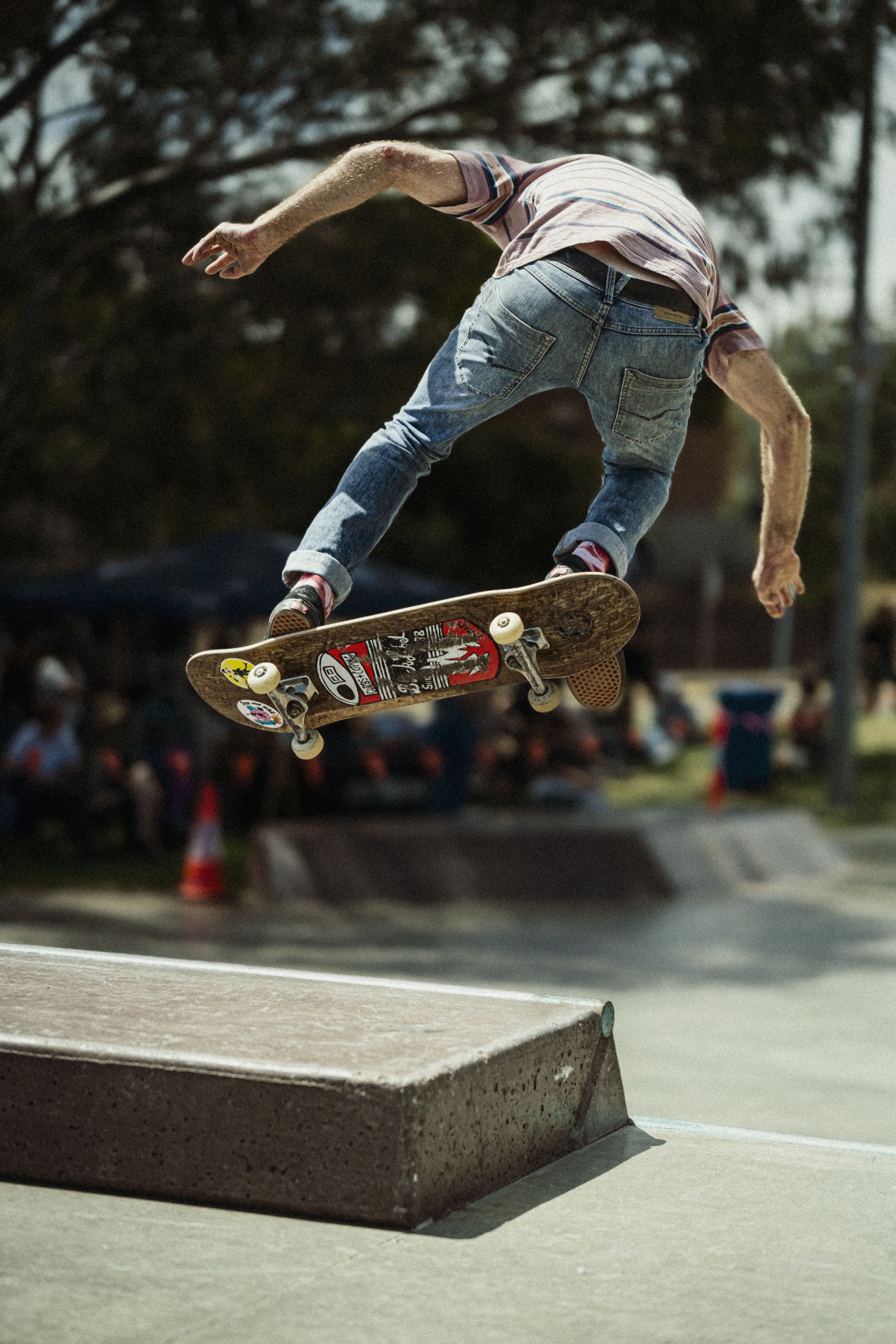 A skateboarder flies through the air.