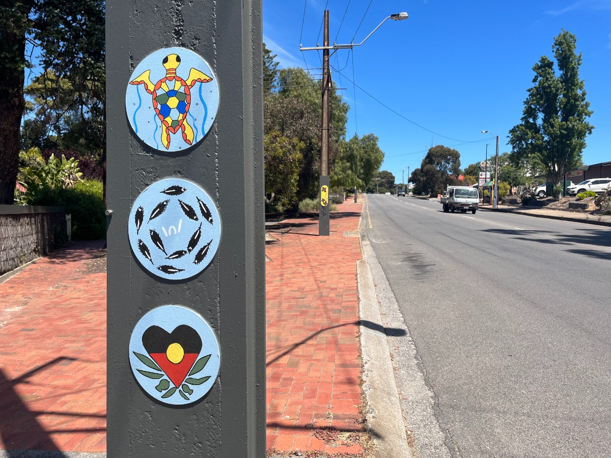 A close-up image of Stobie pole artworks in Old Reynella.