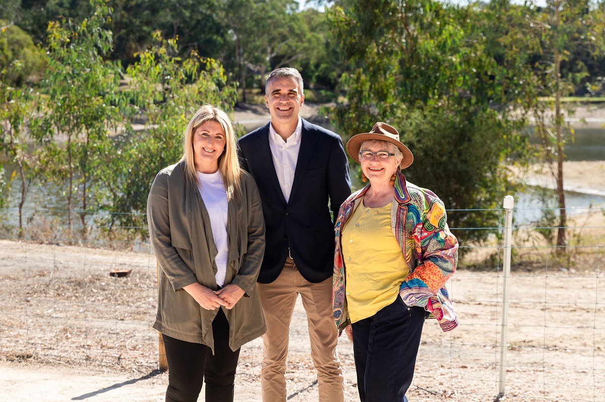 Erin Thompson MP, Premier Peter Malinauskas and Mayor Moira Were smile while standing on the new Minkarra Path Link Path.