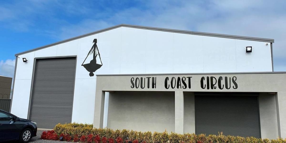 The exterior of the white South Coast Circus building in Aldinga Beach.