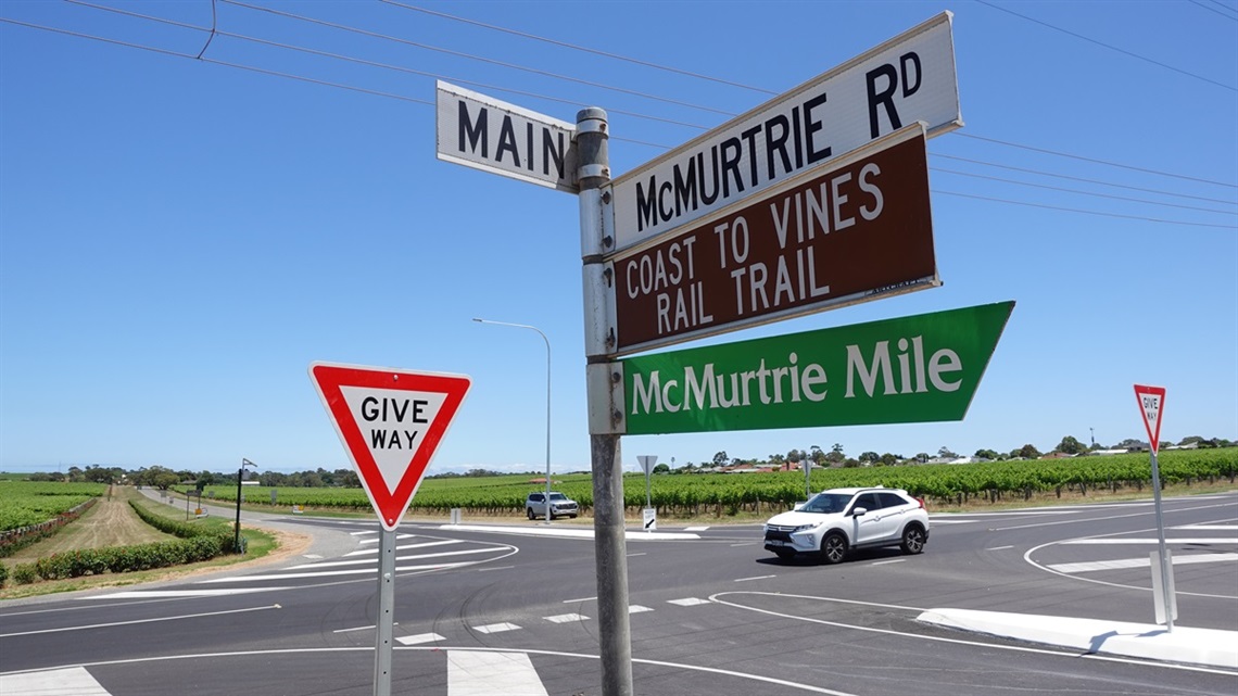 A view of the streetsigns alongside the intersection of Main Road, McMurtrie Road and Johnston Road at McLaren Vale.