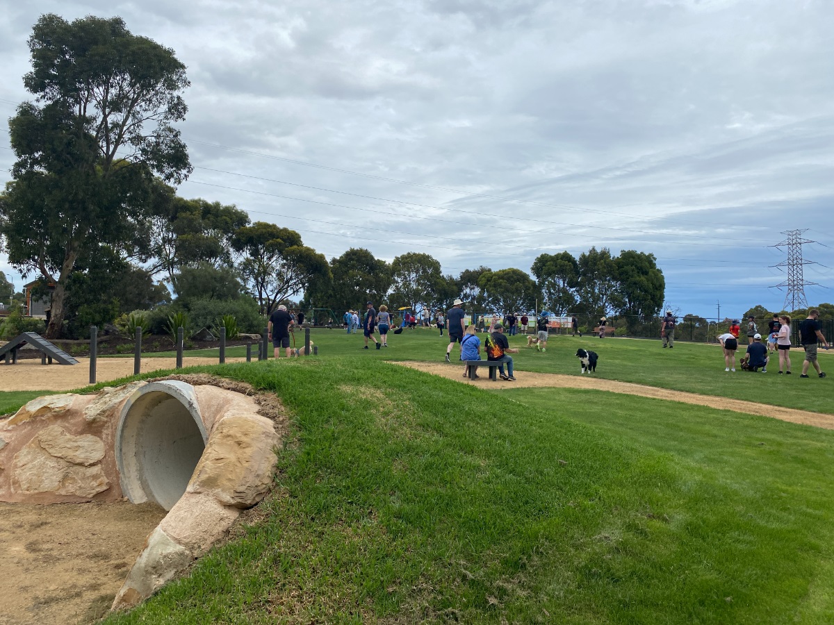 A grassy area of Woodcroft Dog Park.
