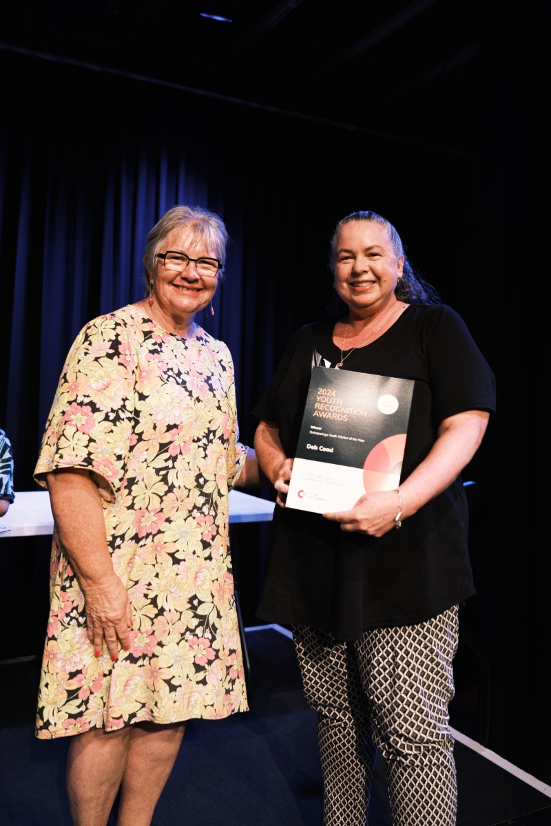City of Onkaparinga Mayor Moira Were presents a certificate and trophy to Deb Coad during the 2024 City of Onkaparinga Youth Recognition Awards ceremony.