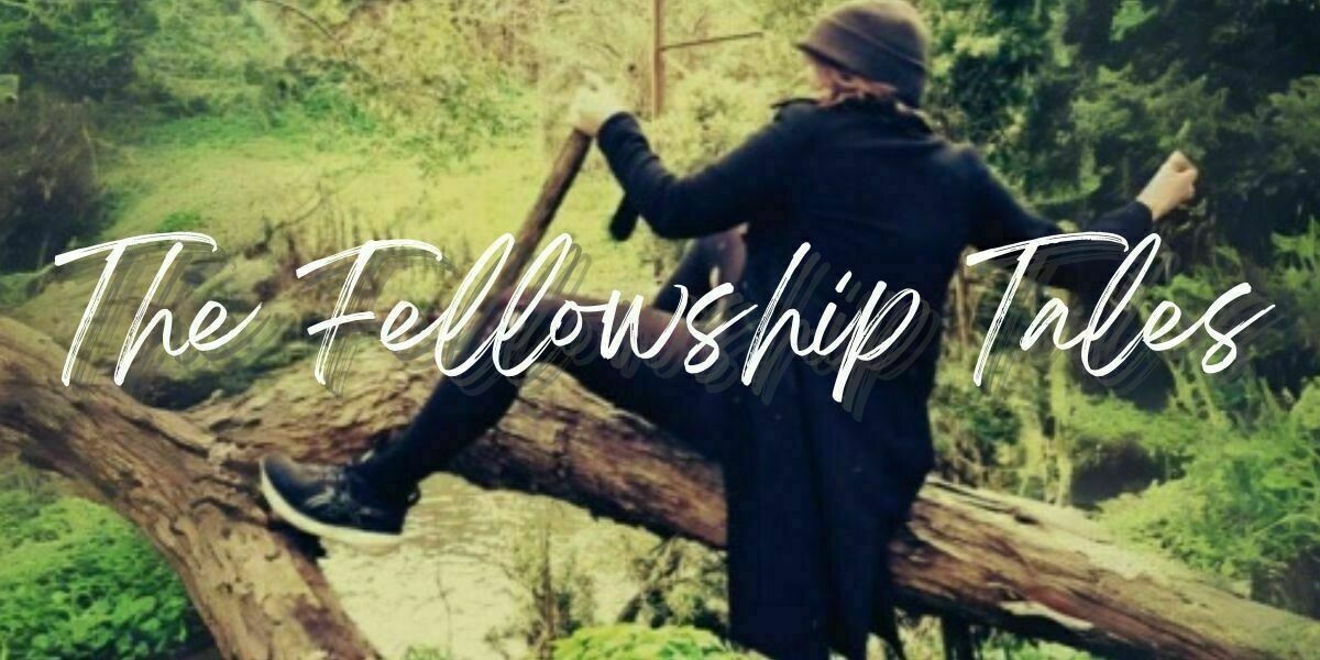 A faded photograph of a black-clad person climbing over a log with the words 'The Fellowship Tales' overlaid on the pic.