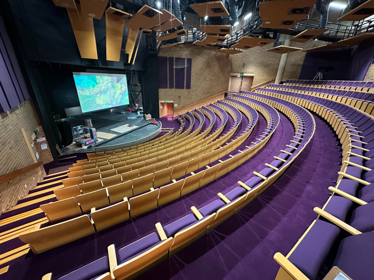 A view from the backseats of the upgraded Hopgood Theatre, looking down at the stage.