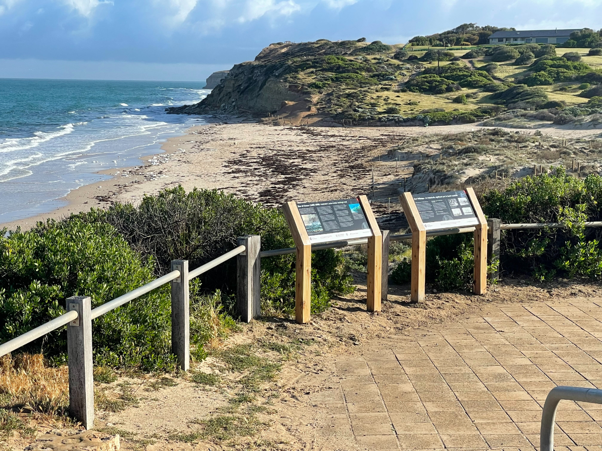 Interpretive signage installed on the foreshore at Port Willunga, looking towards cliffs to the north.