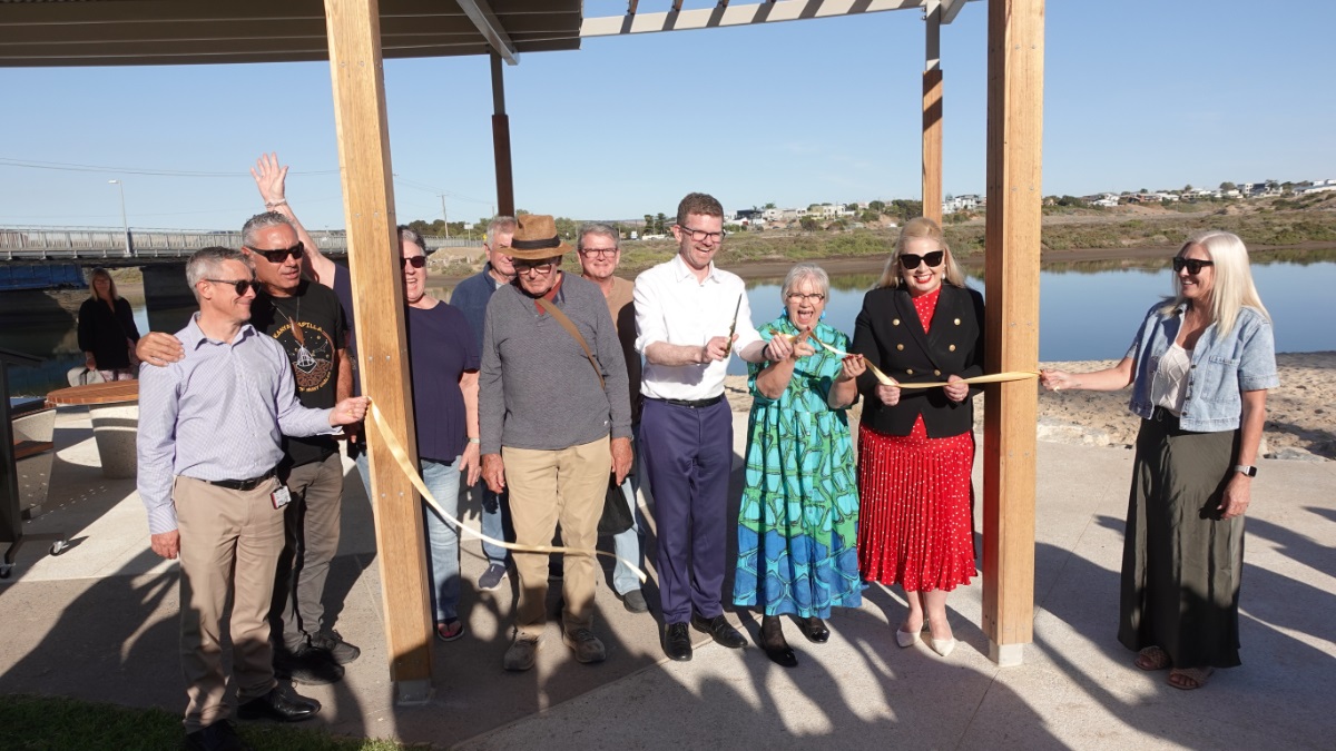 A group of elected members, MPs, Kaurna man Karl Telfer and others cut the ribbon to officially open the Wearing Street precinct stage 2 redevelopment.