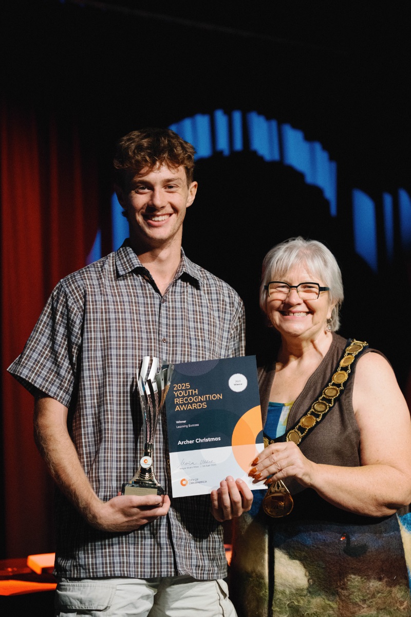 Learning Success Award winner Archer Christmas smiles alongside Onkaparinga Mayor Moira Were.