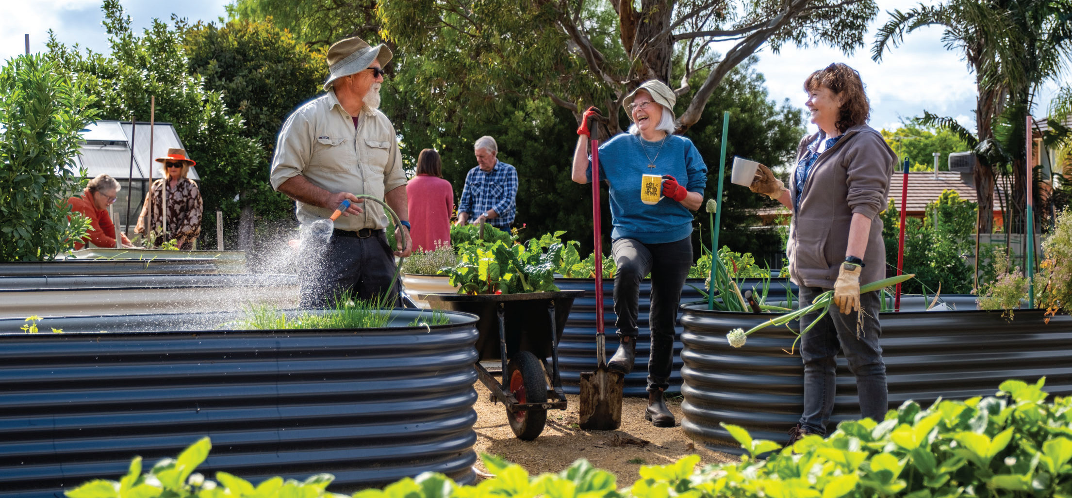 Deborah gets out in the garden with friends at Christie Downs’ Elizabeth House Positive Ageing Centre.