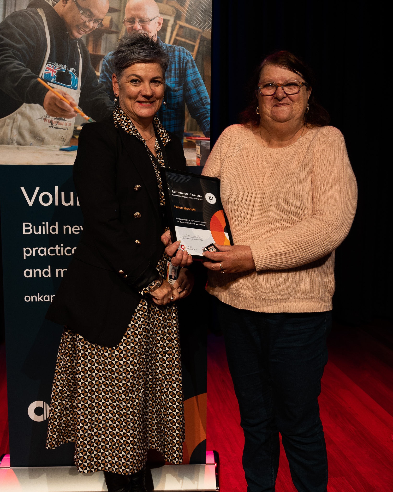 3 Left to right Acting CEO Julia Grant and Helen Bennett receiving 10 year Recognition of Service Certificate.jpg
