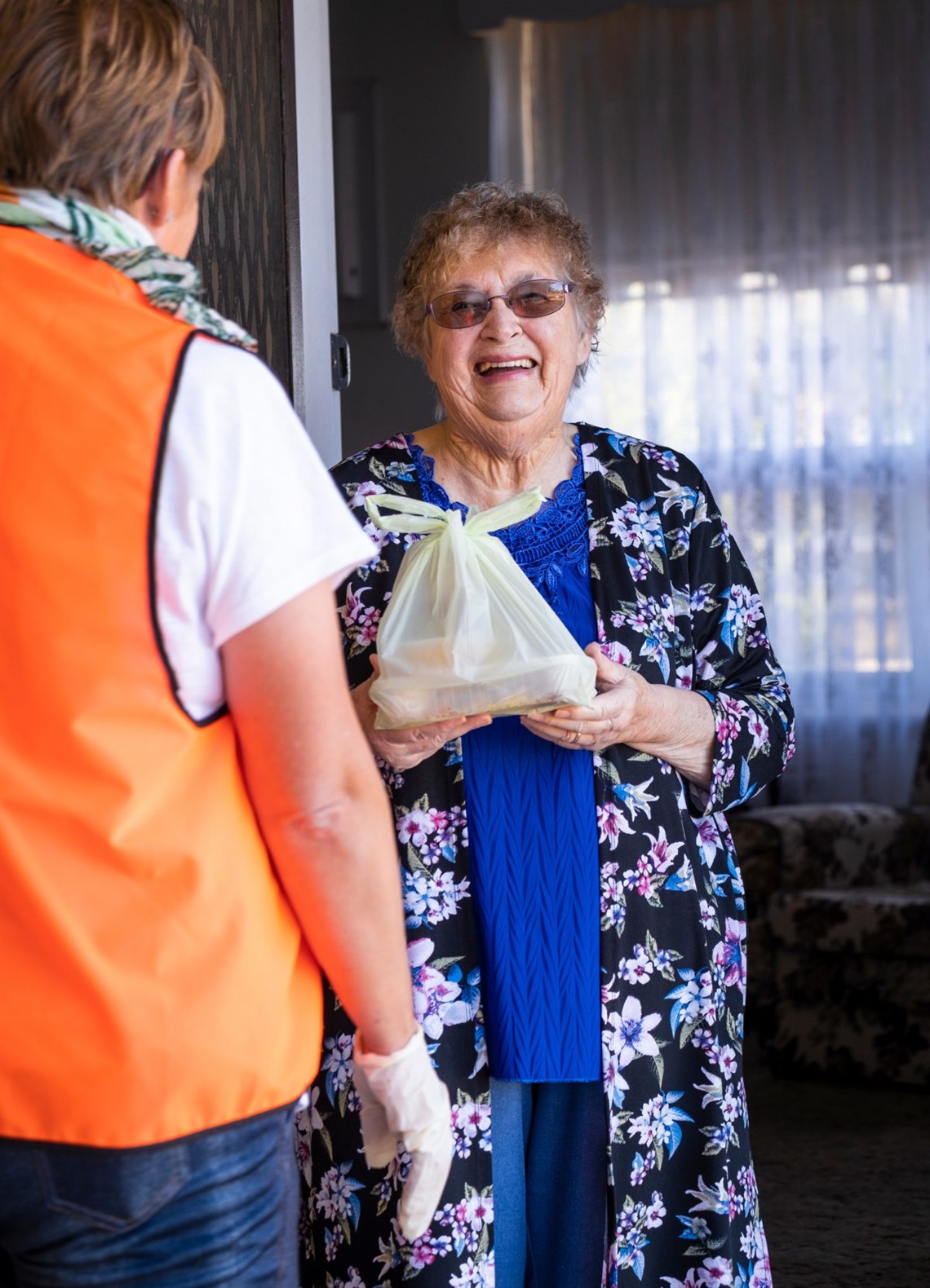 Shirley Butler has her meal delivered